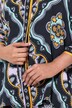 Chemisier oversize. Col classique, manches 3/4. Motif fantaisie