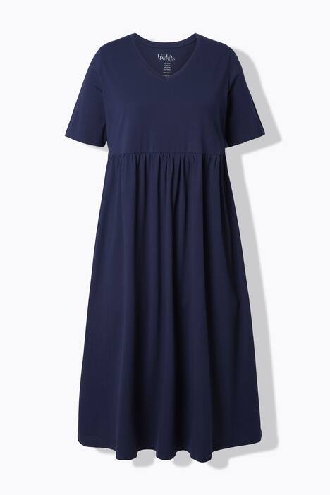 Robe maxi, coupe évasée. Décolleté V, manches courtes. Poches