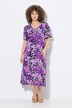 Robe midi en jersey. Décolleté V et manches courtes. Coupe évasée