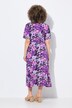 Robe midi en jersey. Décolleté V et manches courtes. Coupe évasée