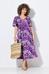 Robe midi en jersey. Décolleté V et manches courtes. Coupe évasée