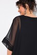 Voile en mousseline oversize. Décolleté rond et manches 3/4. Dentelle