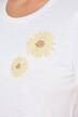 T-shirt en coton bio. Col rond et manches courtes. Motifs brodés
