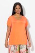 T-shirt oversize en tissu fluide. Décolleté V et manches courtes