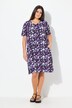 Robe en jersey à fleurs. Décolleté V et manches courtes. Coupe évasée