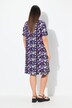 Robe en jersey à fleurs. Décolleté V et manches courtes. Coupe évasée