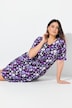 Robe en jersey à fleurs. Décolleté V et manches courtes. Coupe évasée