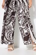 Pantalon esprit portefeuille. Jambe large et taille confortable
