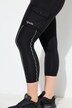 Legging de sport en power stretch, poches cargo et éléments réfléchissants