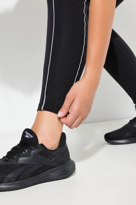 Legging de sport en power stretch, poches cargo et éléments réfléchissants