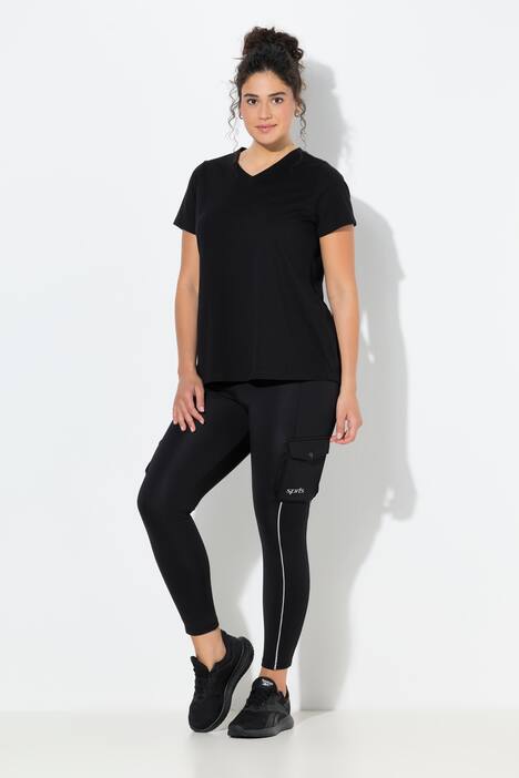 Legging de sport en power stretch, poches cargo et éléments réfléchissants