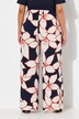 Pantalon en jersey à motif floral. Jambe droite et large. Taille élastique