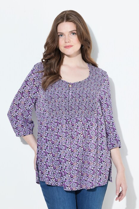 Blouse smockée, motif à fleurs, décolleté rond et manches 3/4, coupe évasée