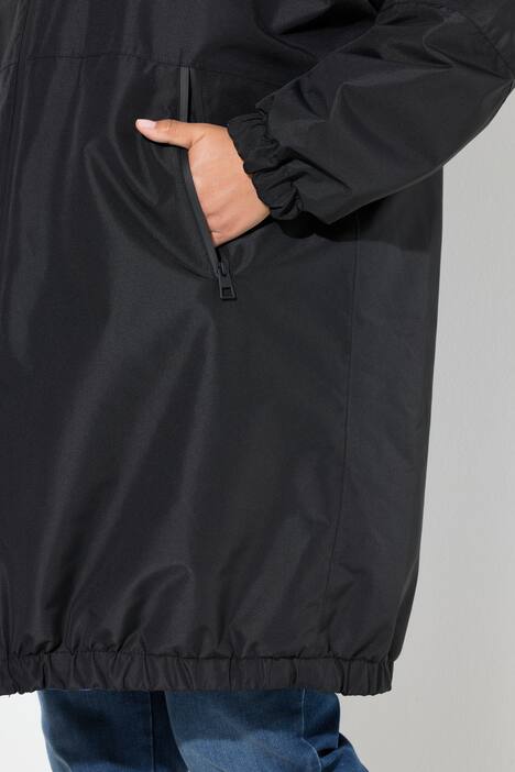 Veste technique oversize à capuche, modèle réversible, avec fermeture à glissière à double sens