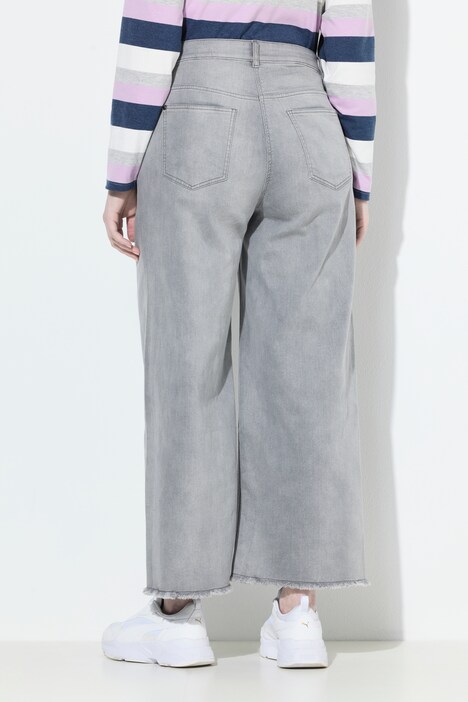 Jean Marie en denim stretch, broderie et bas de jambe avec ourlet frangé