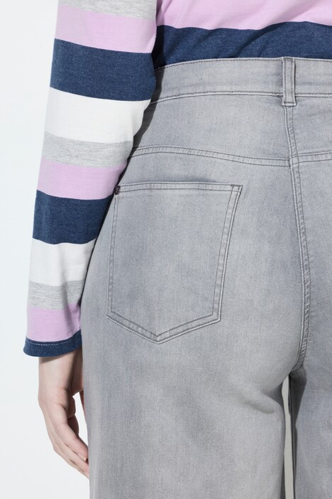 Jean Marie en denim stretch, broderie et bas de jambe avec ourlet frangé