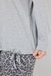 Maglia dal taglio squadrato con fascia nell'orlo, scollo a girocollo e maniche lunghe