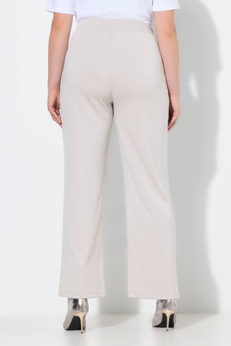 Pantalon en molleton, jambe large et droite, passepoils et taille élastique