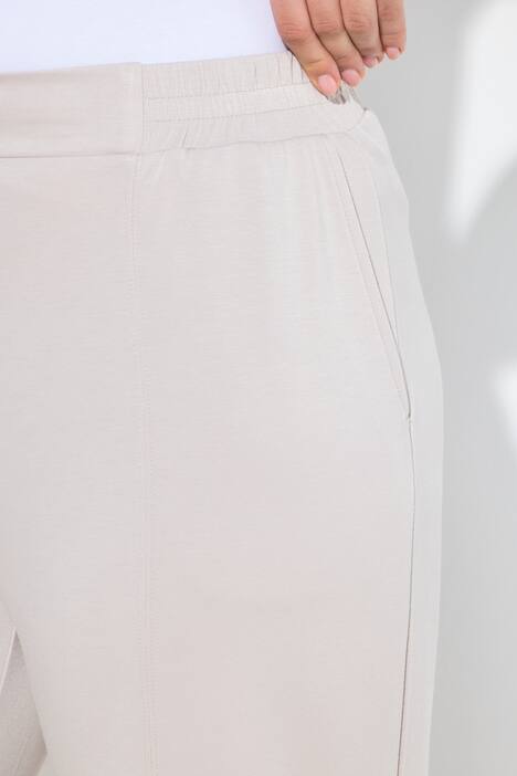 Pantalon en molleton, jambe large et droite, passepoils et taille élastique