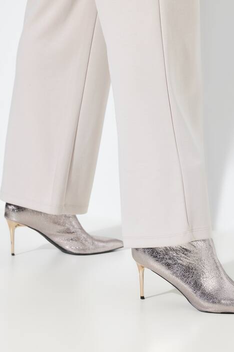 Pantalon en molleton, jambe large et droite, passepoils et taille élastique