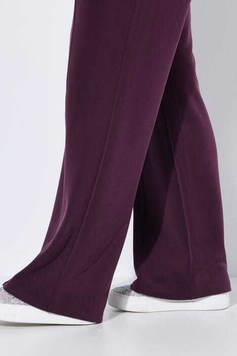 Pantalon en molleton, jambe large et droite, passepoils et taille élastique