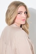 Blusa con pieghe sulle spalle e maniche lunghe
