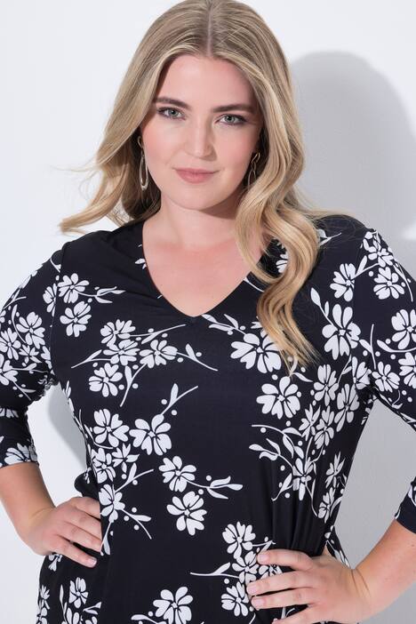T-shirt dal taglio comodo con fiori e orlo a punte