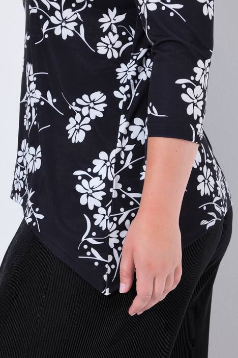 T-shirt dal taglio comodo con fiori e orlo a punte