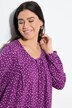 Maglia dal taglio svasato con pieghe decorative, scollo rettangolare e maniche lunghe