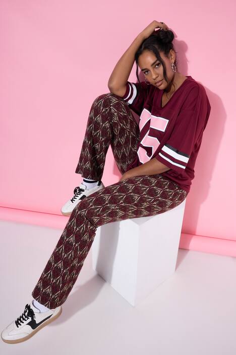 Uitlopende broek, flared pijpen, jacquardmotief, glitter