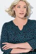 Robe en jersey à coupe évasée. Col tunisien et manches 3/4. Poches