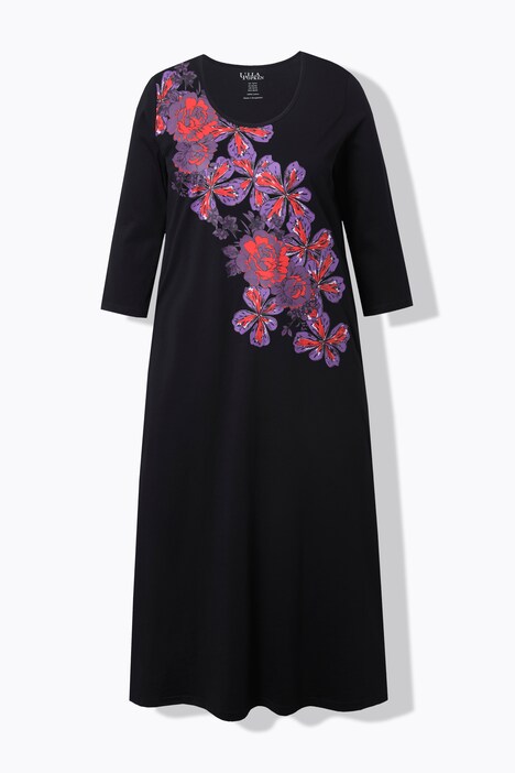 Robe en jersey, motif à fleurs. Col rond et manches 3/4. Coupe évasée