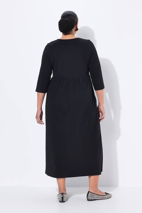 Robe maxi en jersey, poches, décolleté rond et manches 3/4, coupe évasée