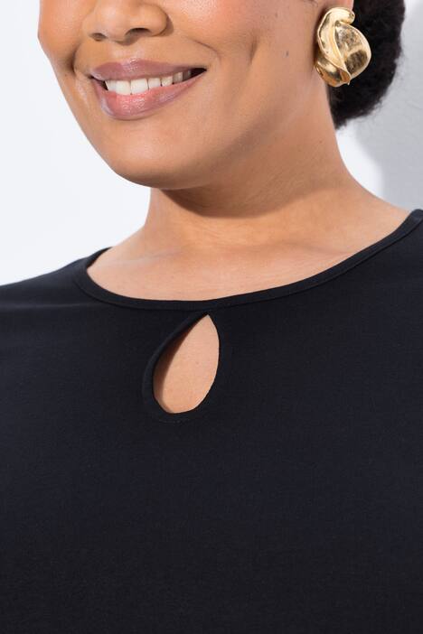 Robe maxi en jersey, poches, décolleté rond et manches 3/4, coupe évasée