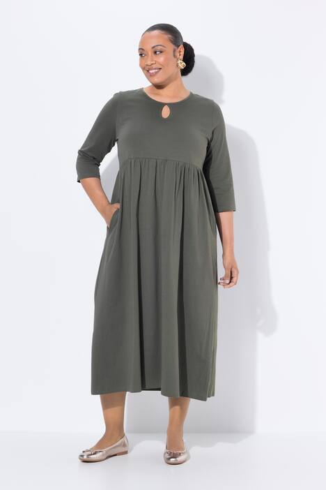 Robe maxi en jersey, poches, décolleté rond et manches 3/4, coupe évasée