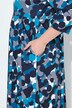 Robe en jersey, imprimé pois. Col rond et manches 3/4. Coupe évasée