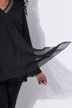 Blouse en mousseline doublée, décolleté en V et manches courtes, coupe évasée