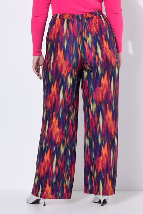 Pantalon plissé. Jambe droite et large. Motif coloré