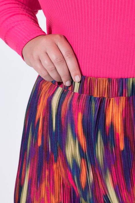 Pantalon plissé. Jambe droite et large. Motif coloré