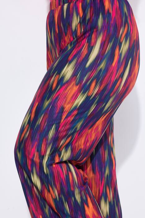 Pantalon plissé. Jambe droite et large. Motif coloré