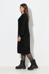 Robe en maille. Décolleté V et manches longues