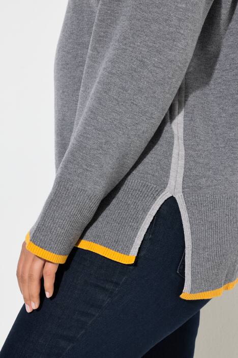Pull en maille. Col roulé et manches longues