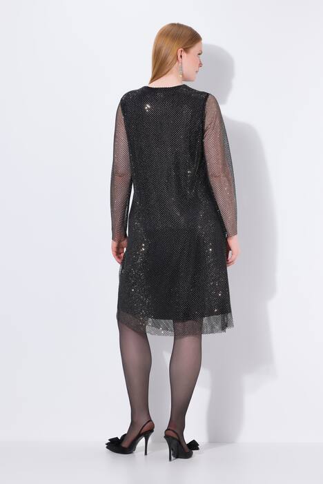 Robe midi à paillettes, coupe trapèze. Décolleté en V, manches longues