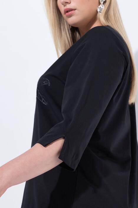 Maglia con fiori, scollo a barca e maniche lunghe