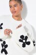 Pull oversize en maille fantaisie. Motif fleurs