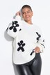 Pull oversize en maille fantaisie. Motif fleurs