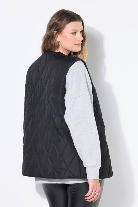 Chaleco acolchado ligero, forma oversize, botones automáticos