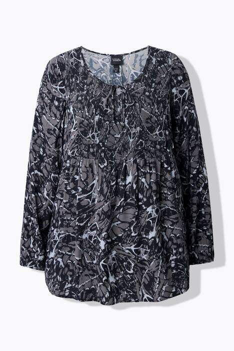 Blouse smockée ligne en A, motif papillons. Col rond et manches 3/4