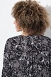 Blouse smockée ligne en A, motif papillons. Col rond et manches 3/4