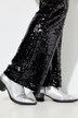 Pantalon à paillettes, coupe flared et bas de jambe avec revers